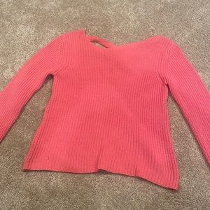 Pink cableknit sweater with criss cross back